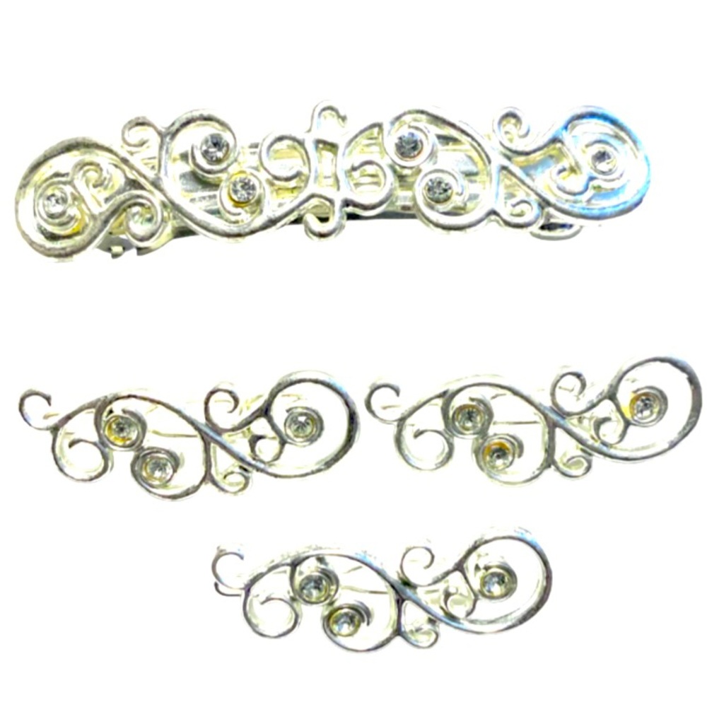 Four Silver Tone Crystal Swirl Barrettes